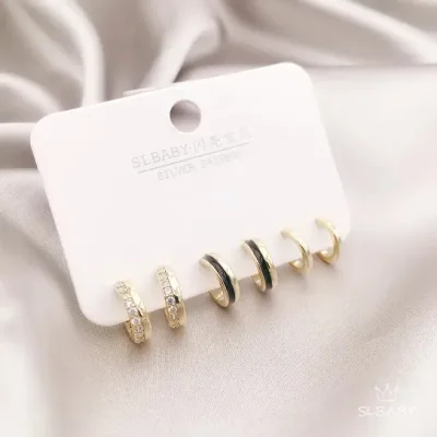 Set de aretes plata 925 con baño de oro diseño de argollas