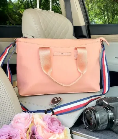 Bolso Tommy Hilfiger para dama color coral