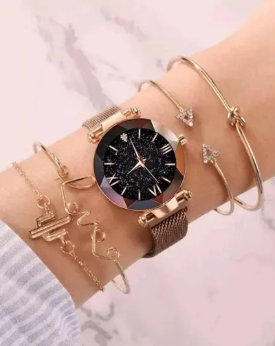 Reloj para dama de cuarzo con puntero redondo color oro rosa