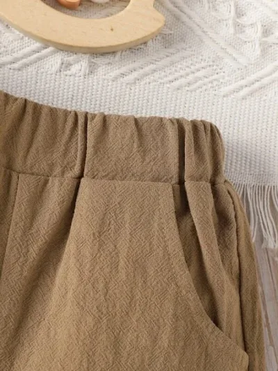 Conjunto para niño verde y cafe con diseño de animales