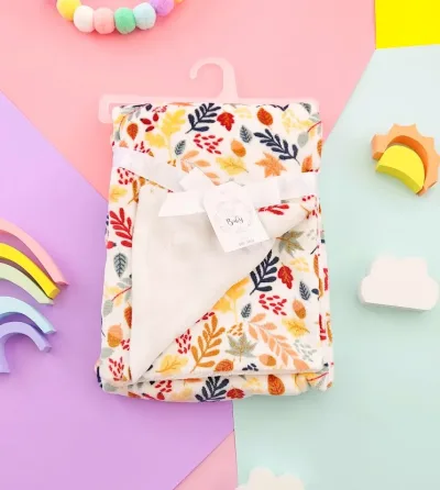 Cobija para niño con diseño de hojas