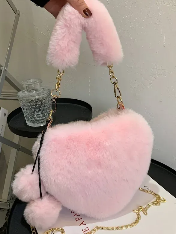 Bolso para dama con diseño de corazón rosa