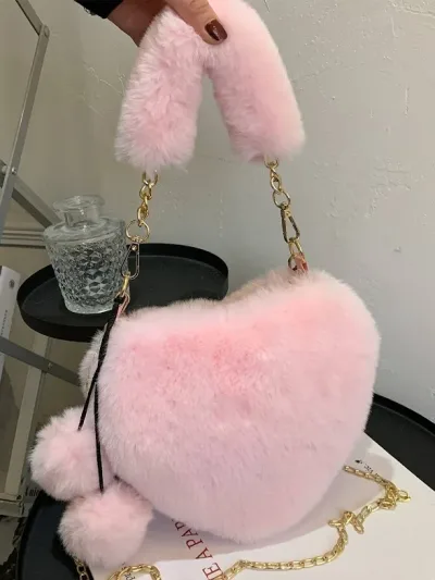 Bolso para dama con diseño de corazón rosa