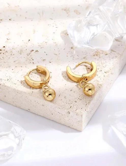 Argollas de acero inoxidable para dama con colgante de bolita
