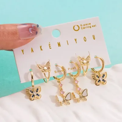 Set de aretes diseño de mariposa de acero inoxidable con baño de oro