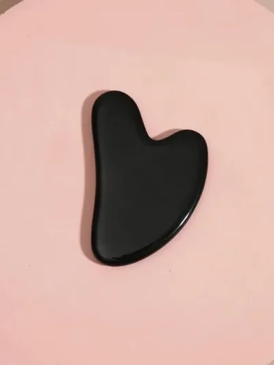 Piedra masajeadora facial Gua Sha
