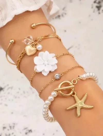 Set de pulseras para dama de fantasía color dorado
