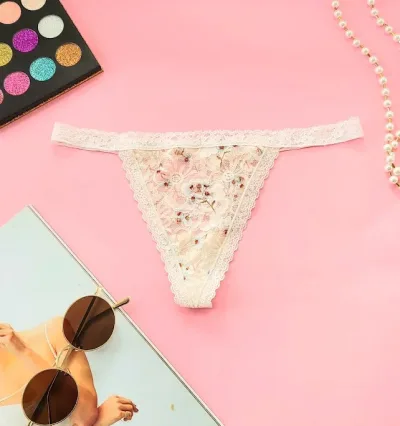 Braga tipo hilo Victoria's Secret para dama color beige con estampado floral