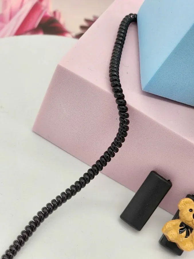 Funda protectora para cargador color negro, diseño oso