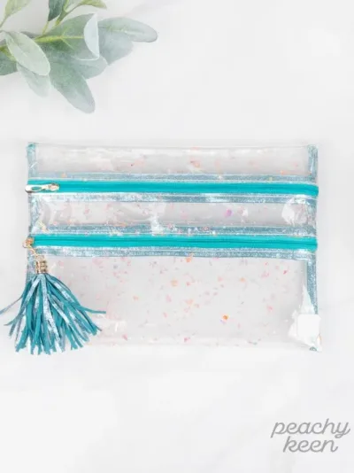 Cartera multiuso para dama transparente con toques tornasol