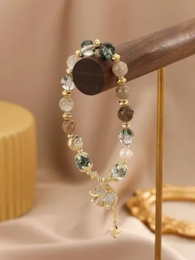Pulsera de cristales naturales para dama con diseño de elefante