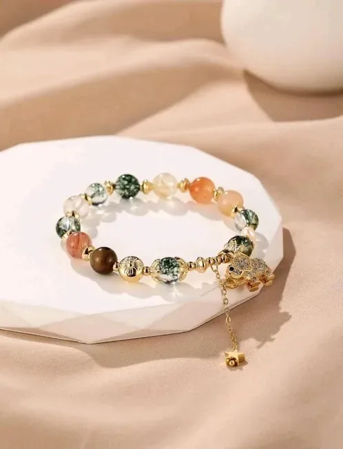 Pulsera de cristales naturales para dama con diseño de elefante