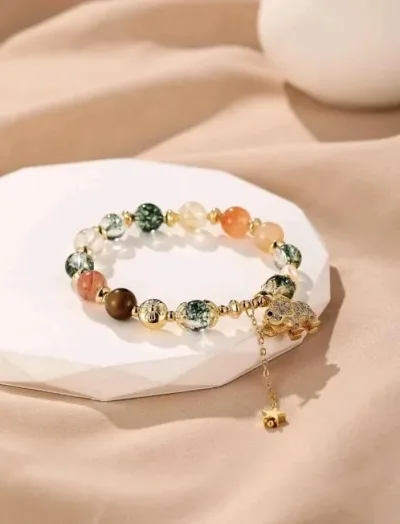 Pulsera de cristales naturales para dama con diseño de elefante