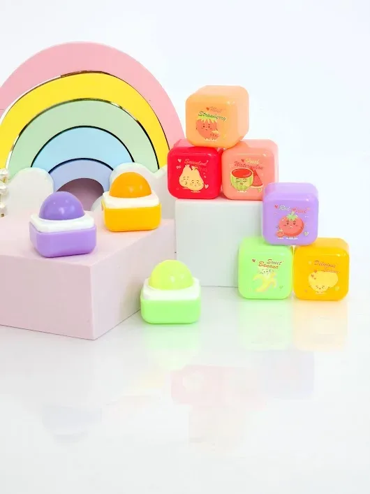 Bálsamos de colores con diseño de frutas al azar