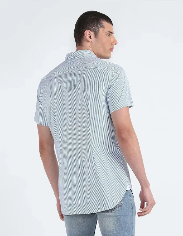 Camisa Tommy Hilfiger para caballero diseño a rayas blanco y verde