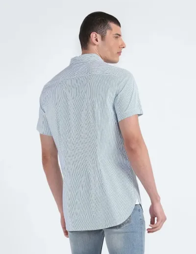 Camisa Tommy Hilfiger para caballero diseño a rayas blanco y verde