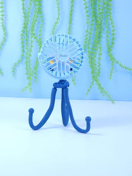 Mini ventilador eléctrico portátil Soporte de pulpo color celeste, figura redonda