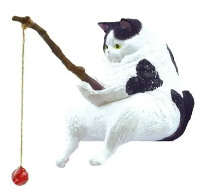 Decoración de gato con manchas blancas y negras