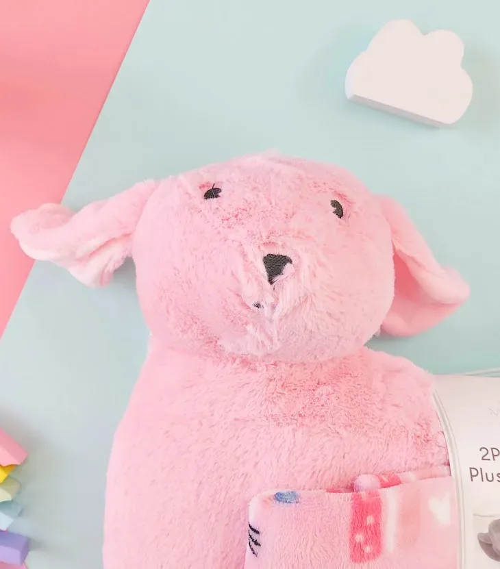 Conjunto de almohada y cobija con diseño de conejo