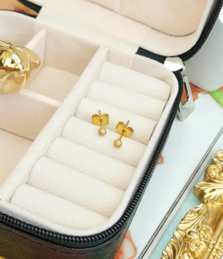 Par de aretes de acero inoxidable para dama