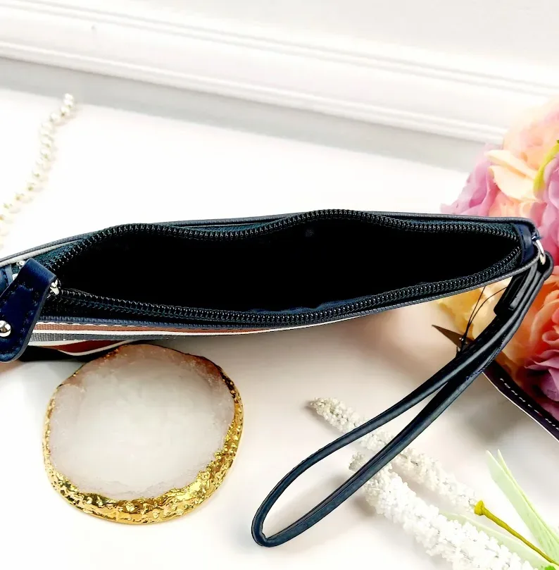 Cartera Tommy Hilfiguer para dama a rayas multicolor