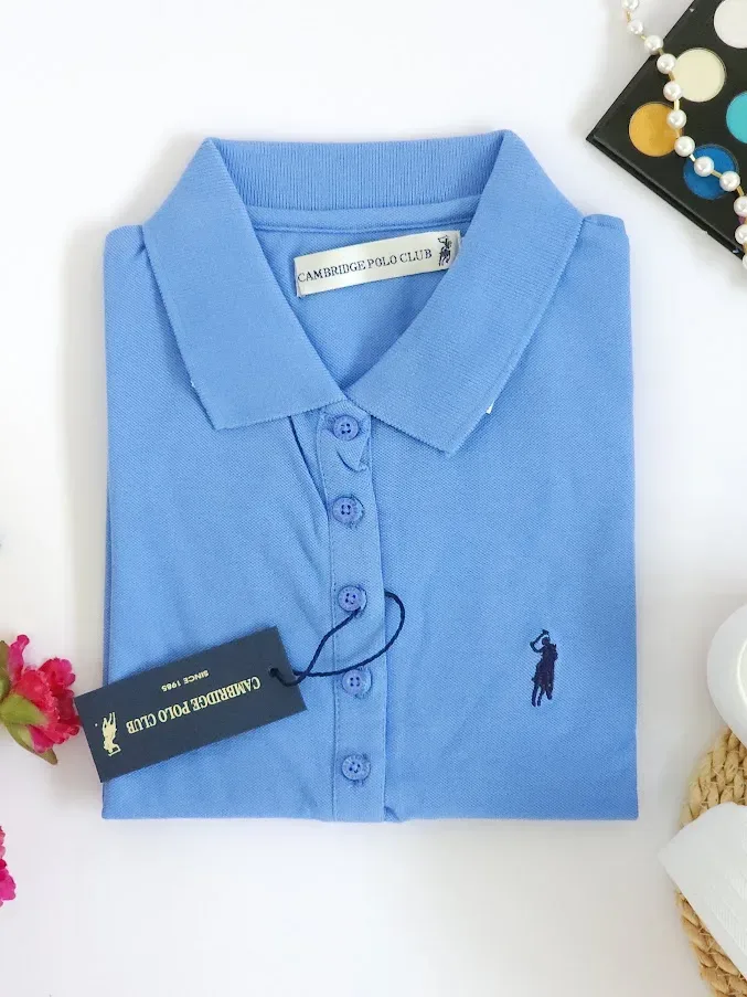 Camiseta Polo Cambrige Club para dama color celeste oscuro