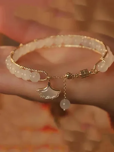 Pulsera tipo brazalete trenzada para dama color blanco
