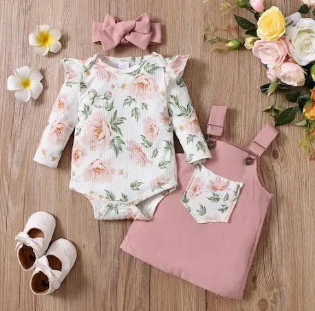 Conjunto de mameluco con vestido para niña color rosa