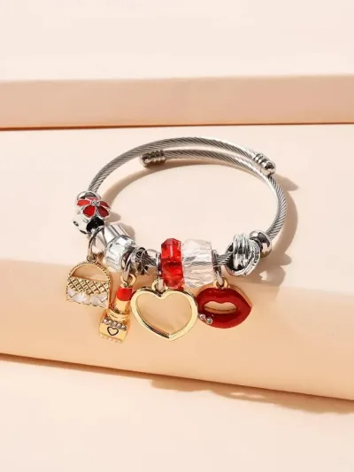 Pulsera de acero inoxidable para dama color plateado con accesorios