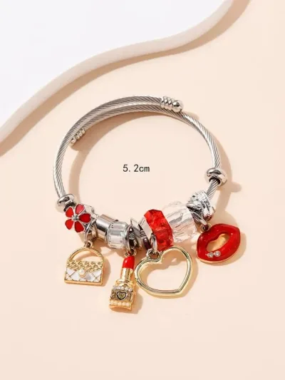 Pulsera de acero inoxidable para dama color plateado con accesorios
