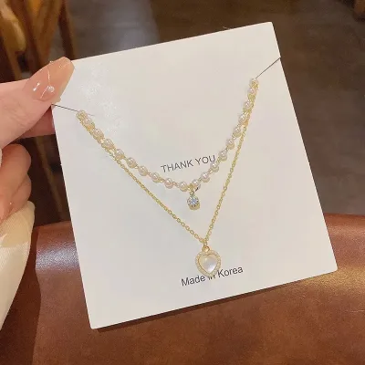 Collar de Acero de Titanio con baño de Oro 18k