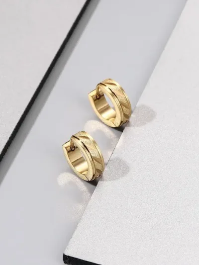 Pendientes de acero inoxidable color dorado con destello