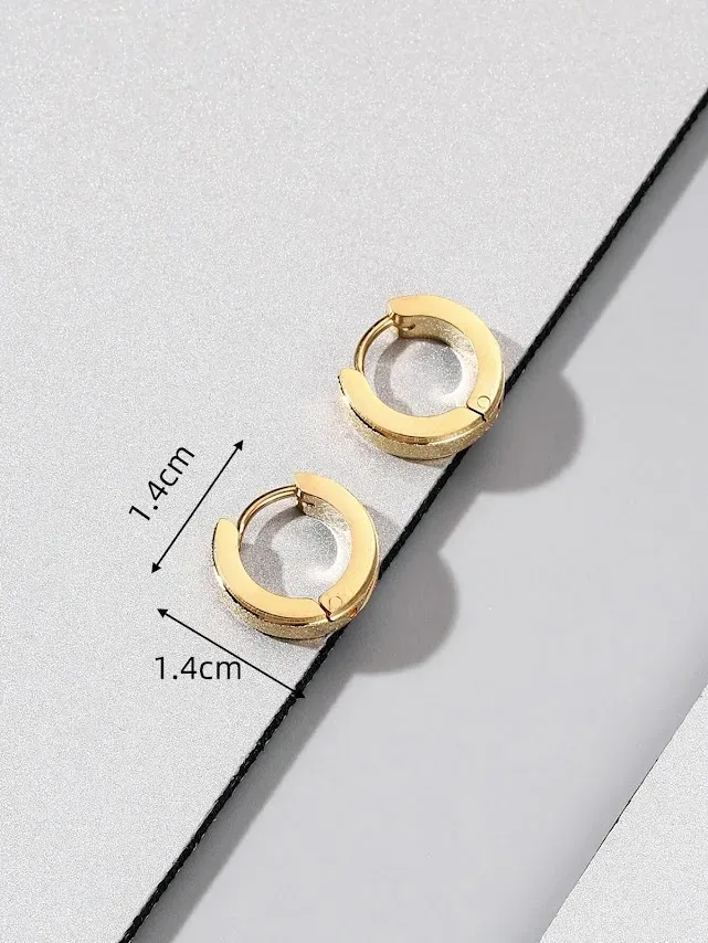 Pendientes de acero inoxidable color dorado con destello