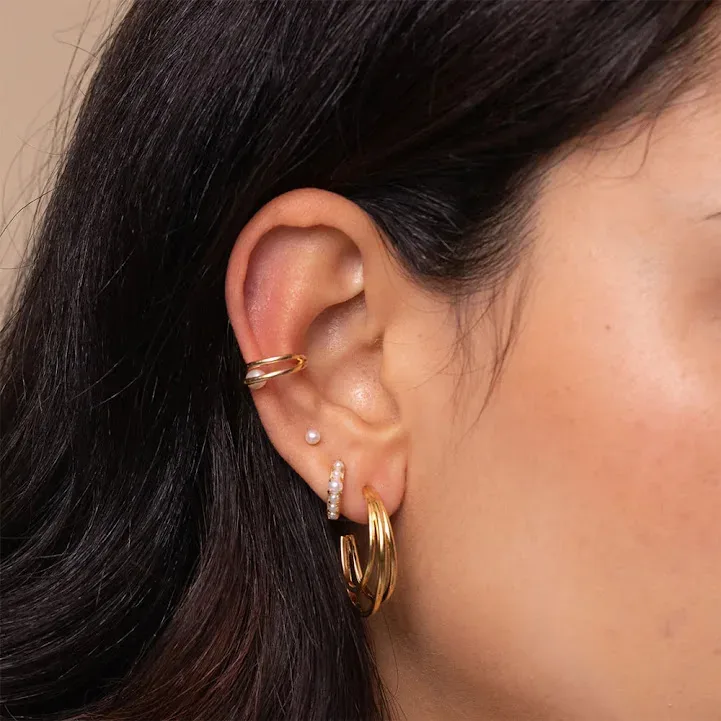 Aretes redondos de plata con perlas