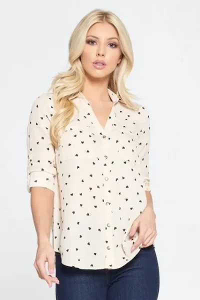 Blusa para dama con diseño de corazones color crema