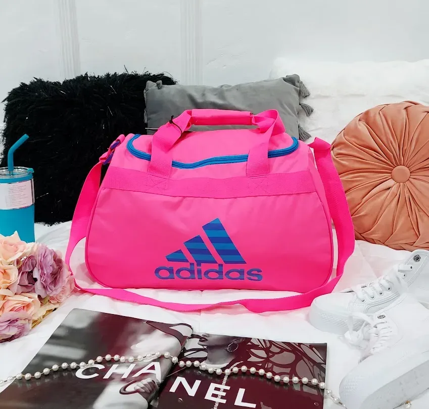 Bolso Adidas para dama color rosa neón y celeste