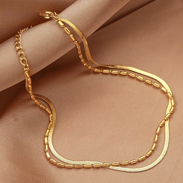 Tobillera para dama de acero de titanio