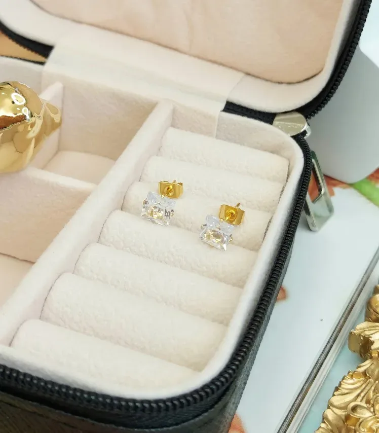 Par de aretes de acero inoxidable para dama