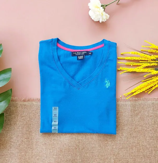 Camiseta U.S Polo para dama color azul franja interior rosada