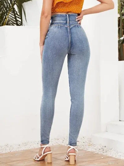 Jeans ajustados de talle alto con cremallera