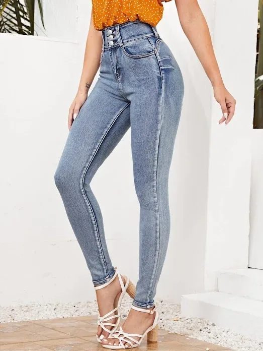 Jeans ajustados de talle alto con cremallera