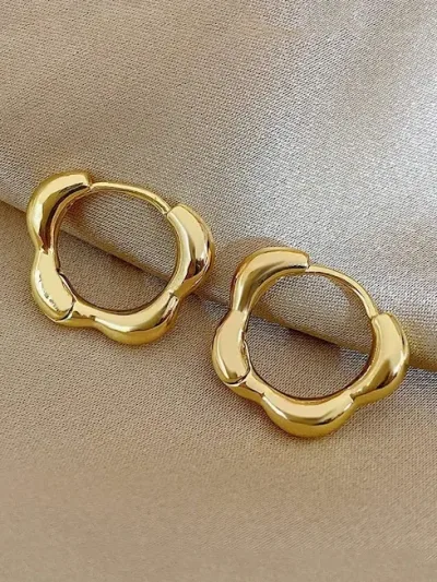 Argollas de acero inoxidable para dama con diseño de flor