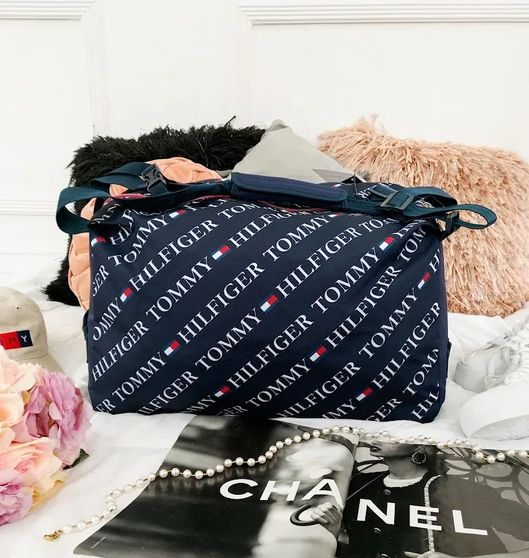 Bolso mochilero Tommy Hilfiger unisex color azul
