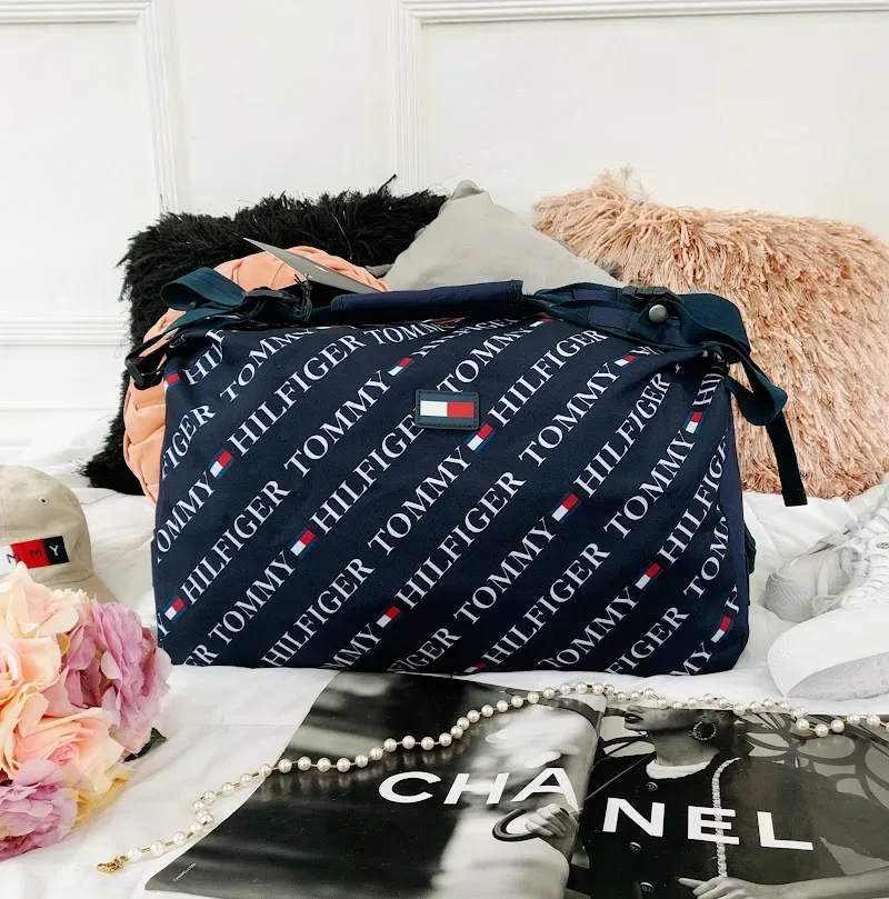 Bolso mochilero Tommy Hilfiger unisex color azul