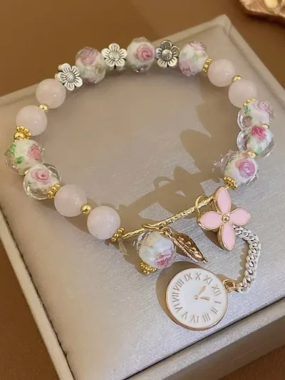 Pulsera para dama de fantasia color rosa con diseño de flor