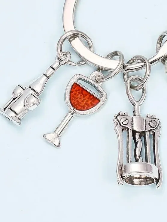 Llavero con diseño de accesorios de vino