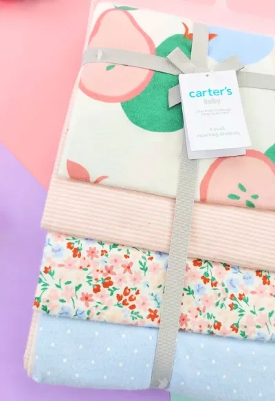 Conjunto de 4 franelas para niña tonos rosa y celestes