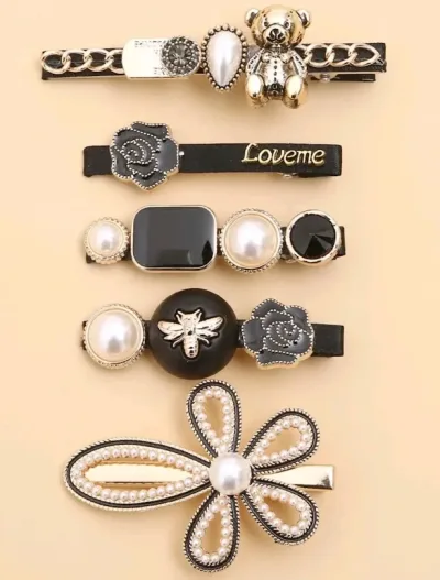 Set de prensas de cabello para dama diseño varios color negri, blanco y dorado